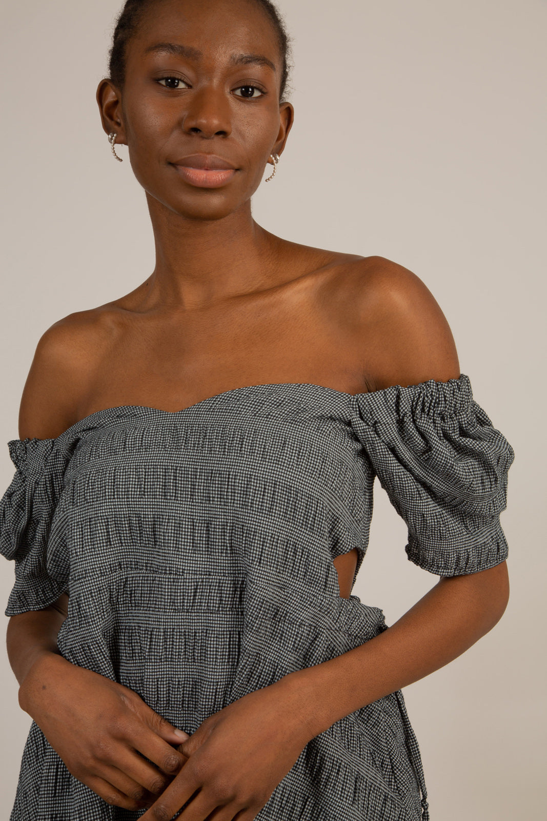 Black and white textured off shoulder mini dress