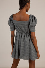 Black and white textured off shoulder mini dress