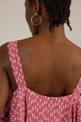 Pink and white triangle print ruffle tank