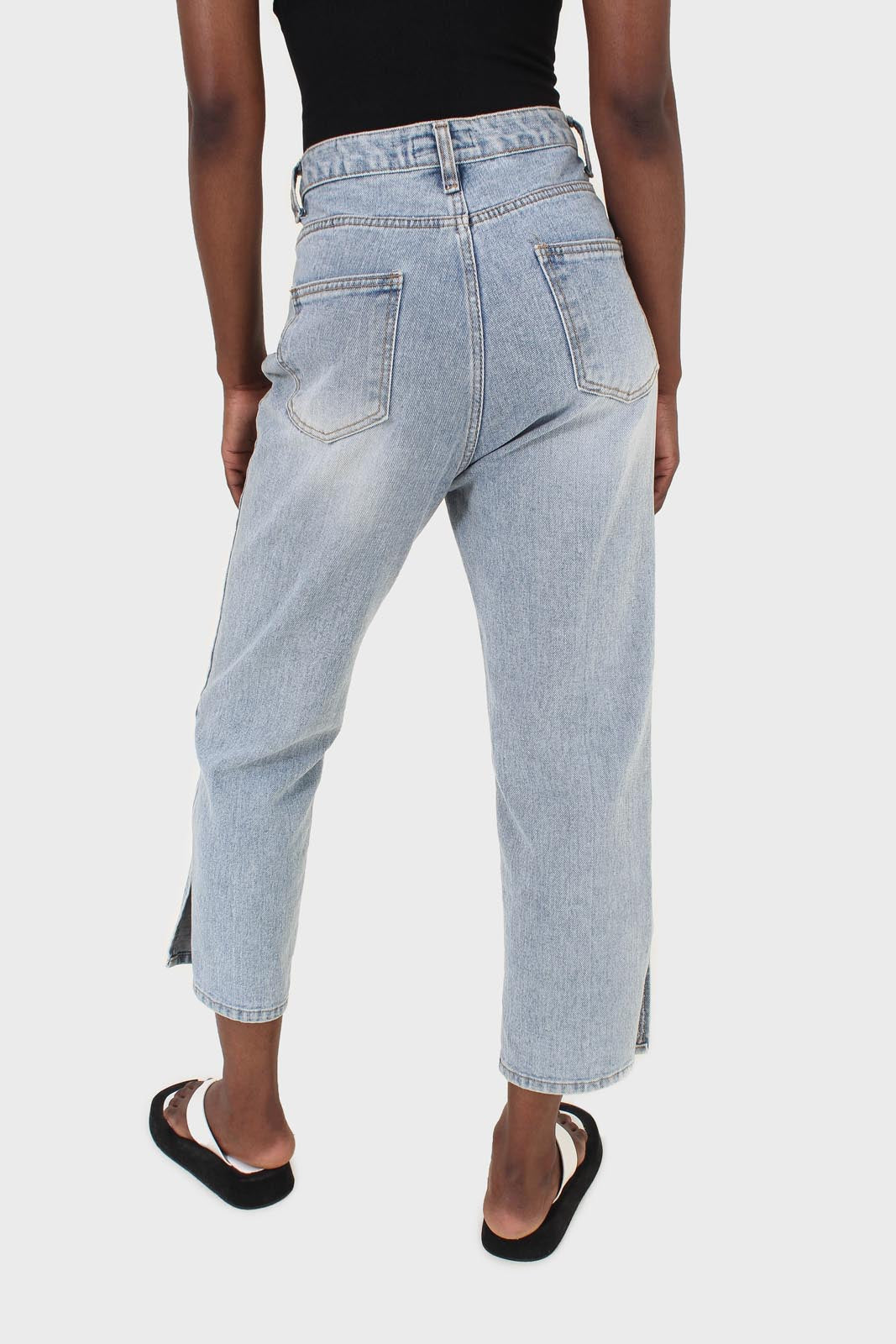 Light blue wash exposed button jeans