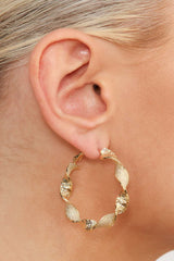 Gold rough smooth twisted hoop earrings