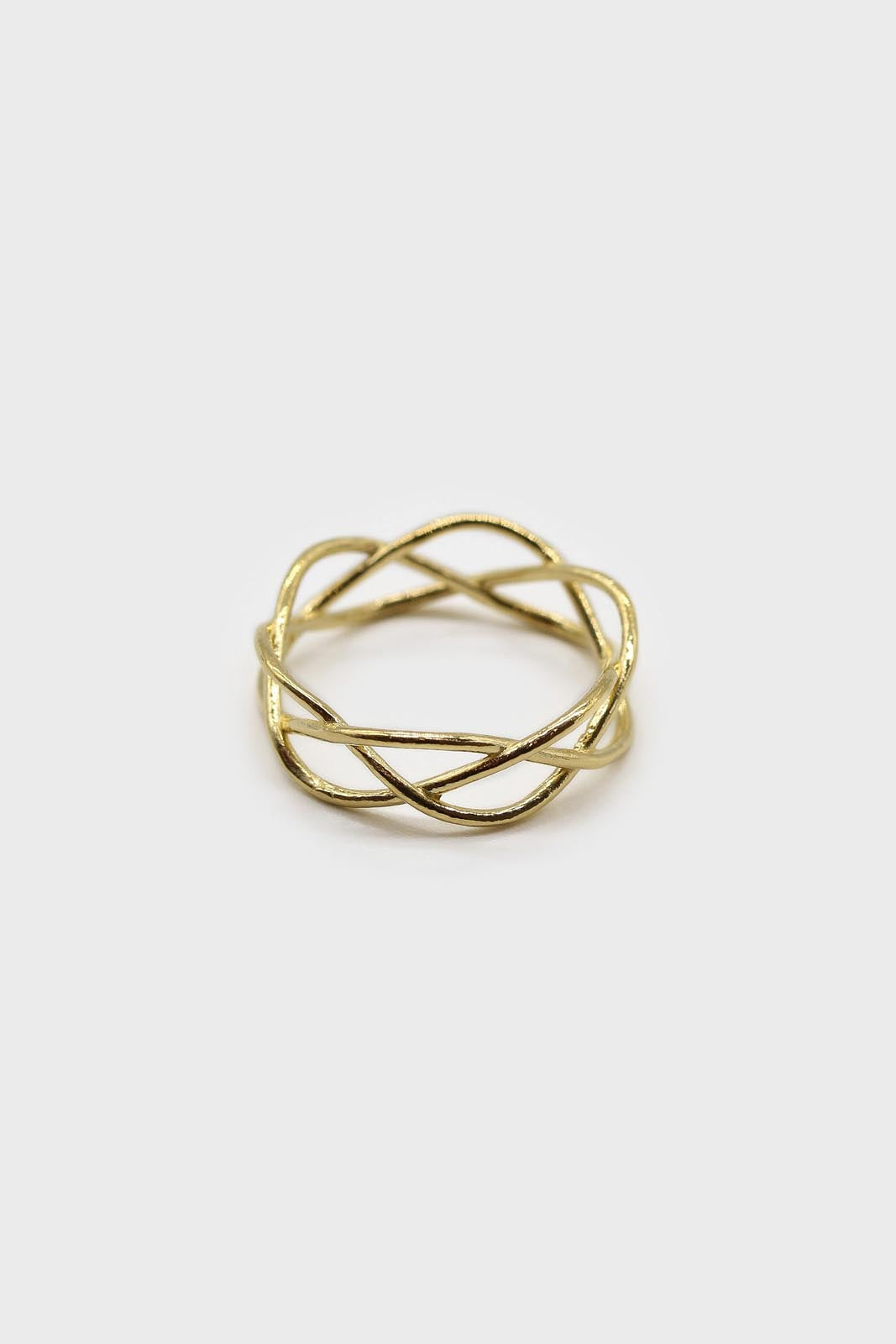 Gold interwoven strands ring