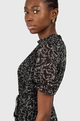Black and white floral micro pleated belted dress