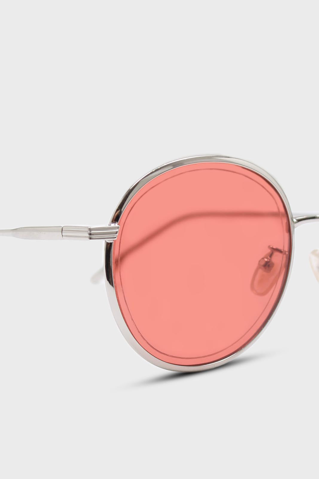 Red and gold lined round sunglasses