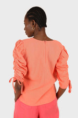 Orange pull string sleeve linen top
