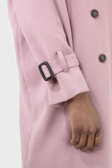 Pale pink double breasted belted trench coat