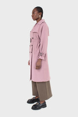 Pale pink double breasted belted trench coat