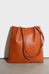 Camel vegan leather pinched strap tote bag