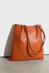 Camel vegan leather pinched strap tote bag