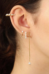 Gold small pearl D earrings