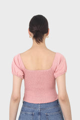 Pink ruched bodice puff sleeved top
