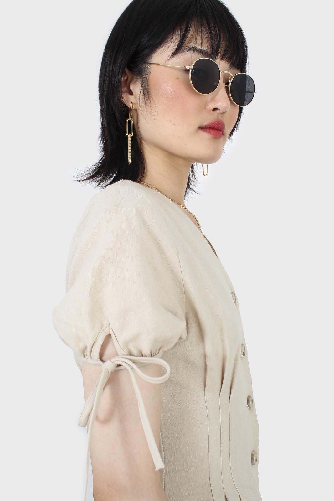 Beige V-neck tie sleeved linen romper