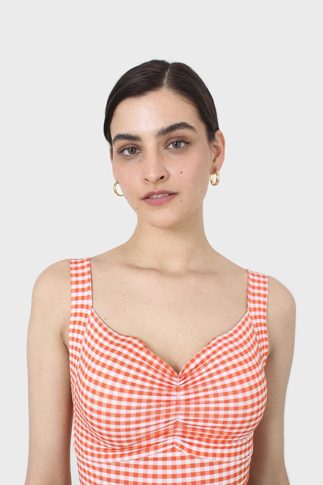 Orange and white gingham cropped tank