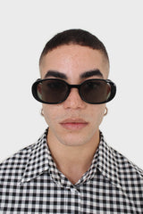 All black thick oval frame sunglasses