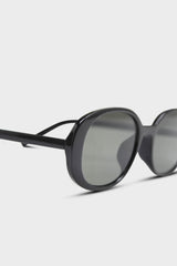 All black thick oval frame sunglasses