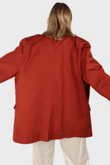Burnt orange flap pocket silky blazer