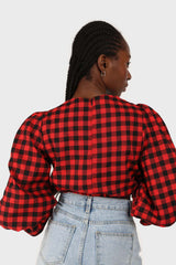 Red and black checked pull string long sleeved top