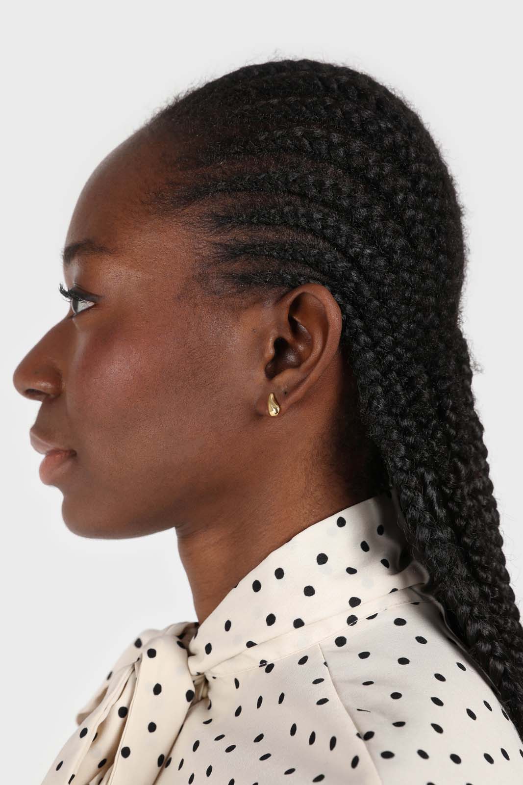 Ivory and black polka dots tie neck blouse