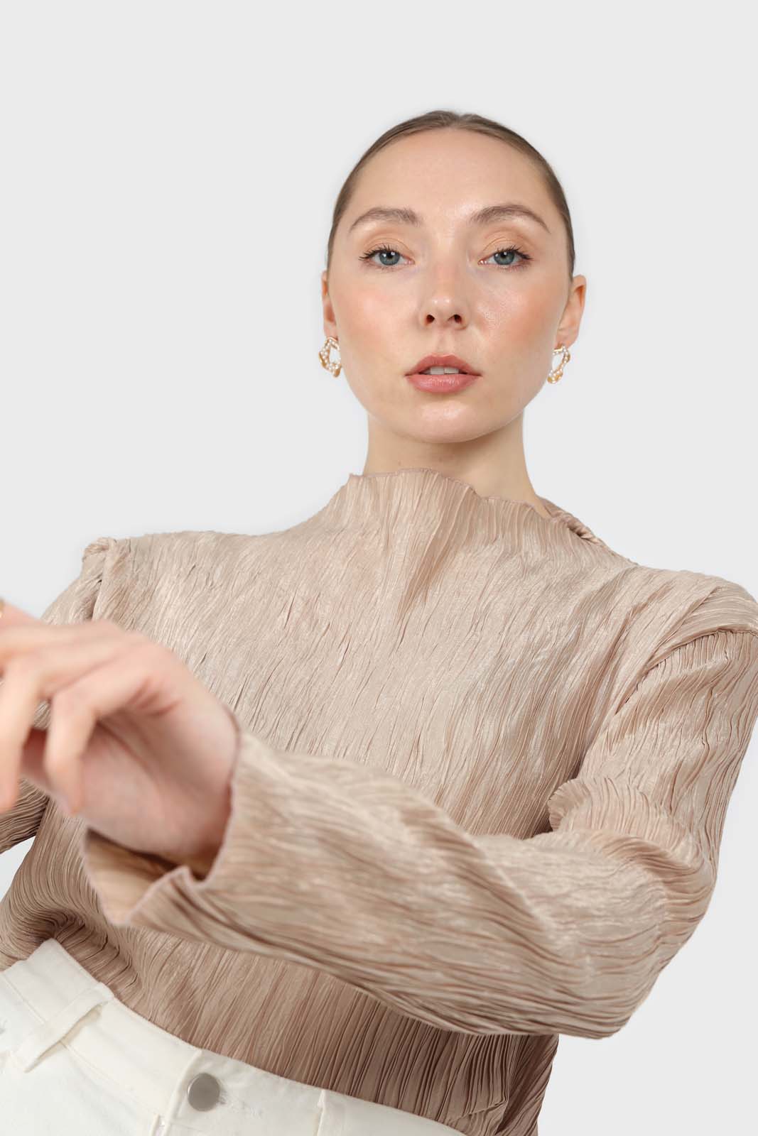 Beige shiny wrinkle mock neck long sleeved top
