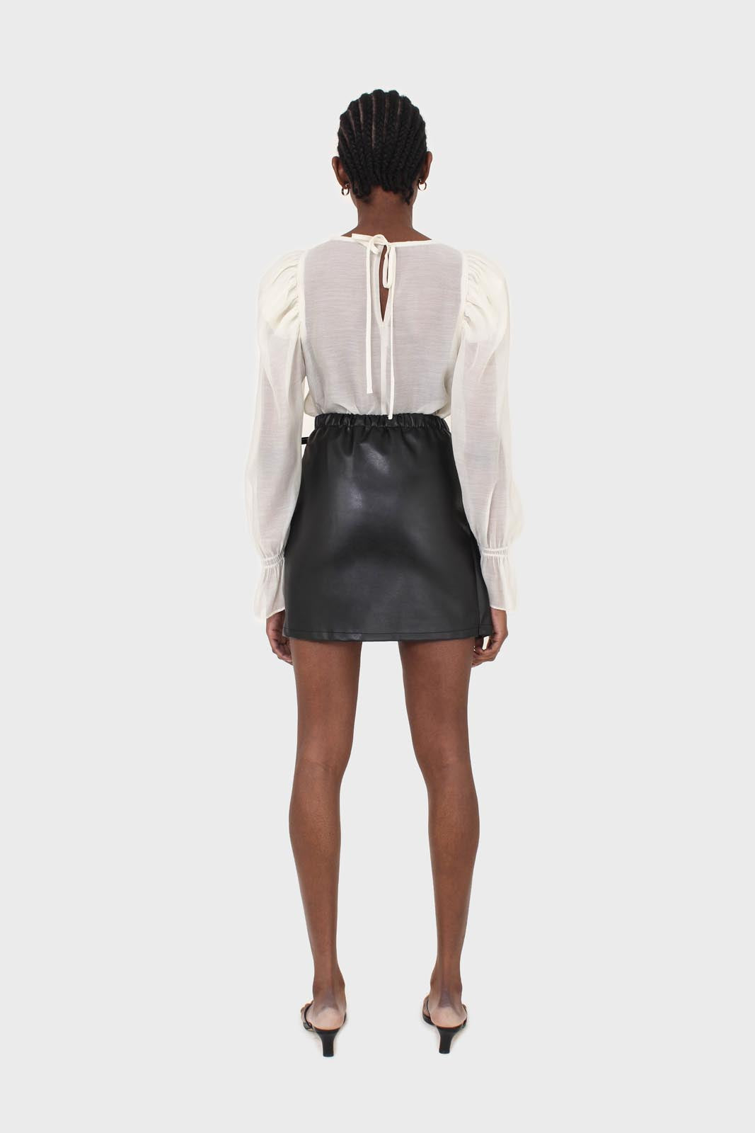 Black vegan leather wrapped tie mini skirt