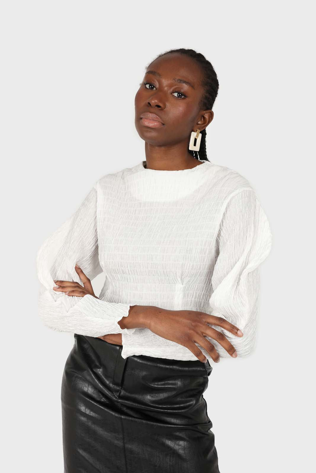 White smocked puff long sleeved top