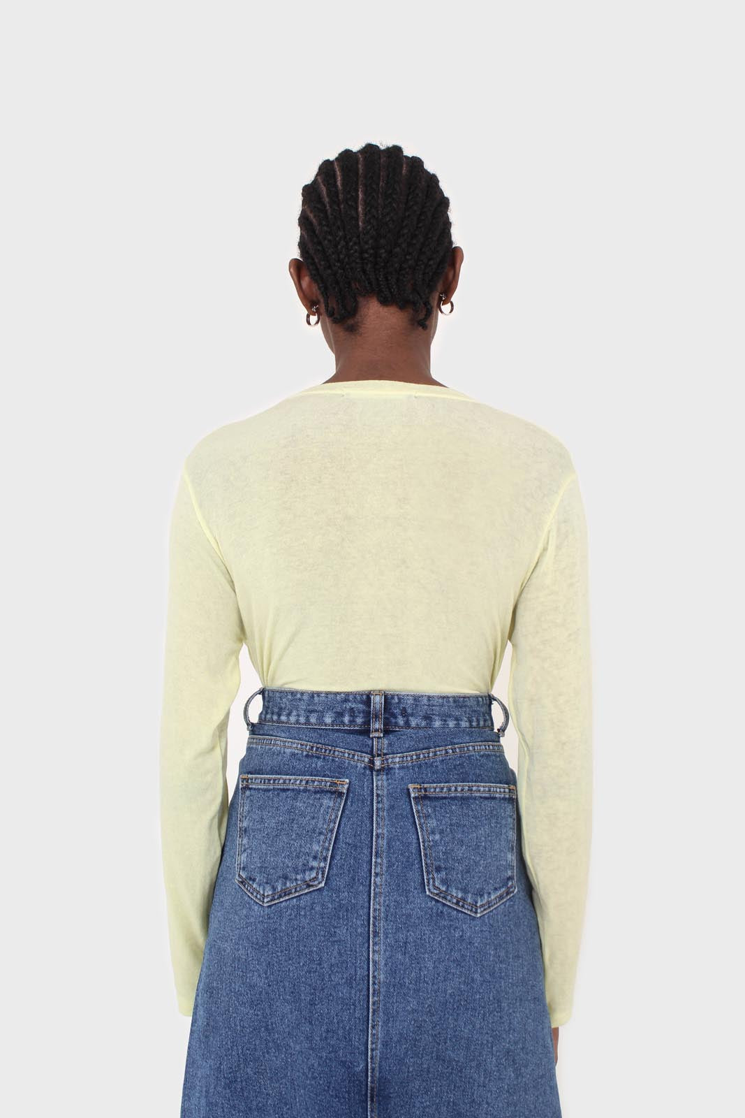 Pale yellow long sleeve jersey top