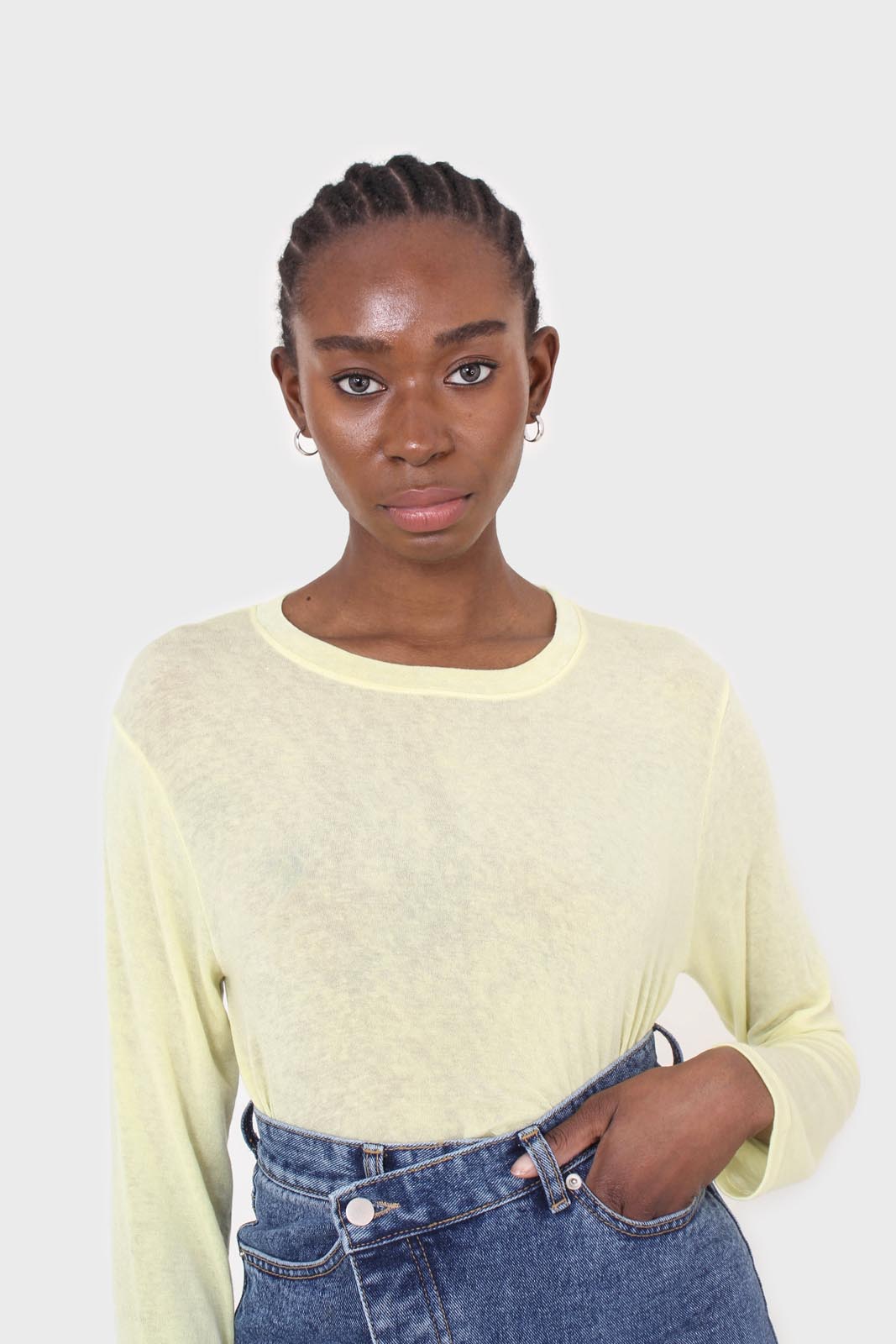 Pale yellow long sleeve jersey top