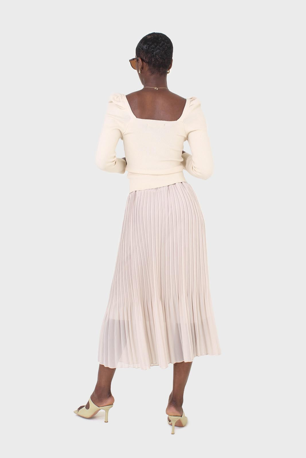 Beige gathered front long sleeved knit top