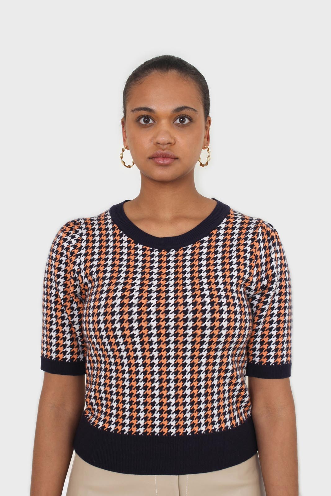 Black and orange check short sleeve knit top