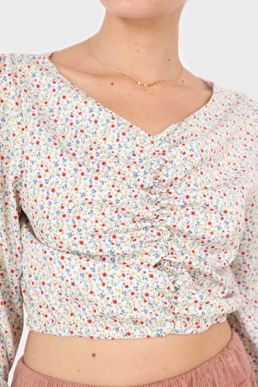 Ivory floral ruched front long sleeved blouse