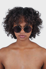 Gold trim black lens angled aviator sunglasses