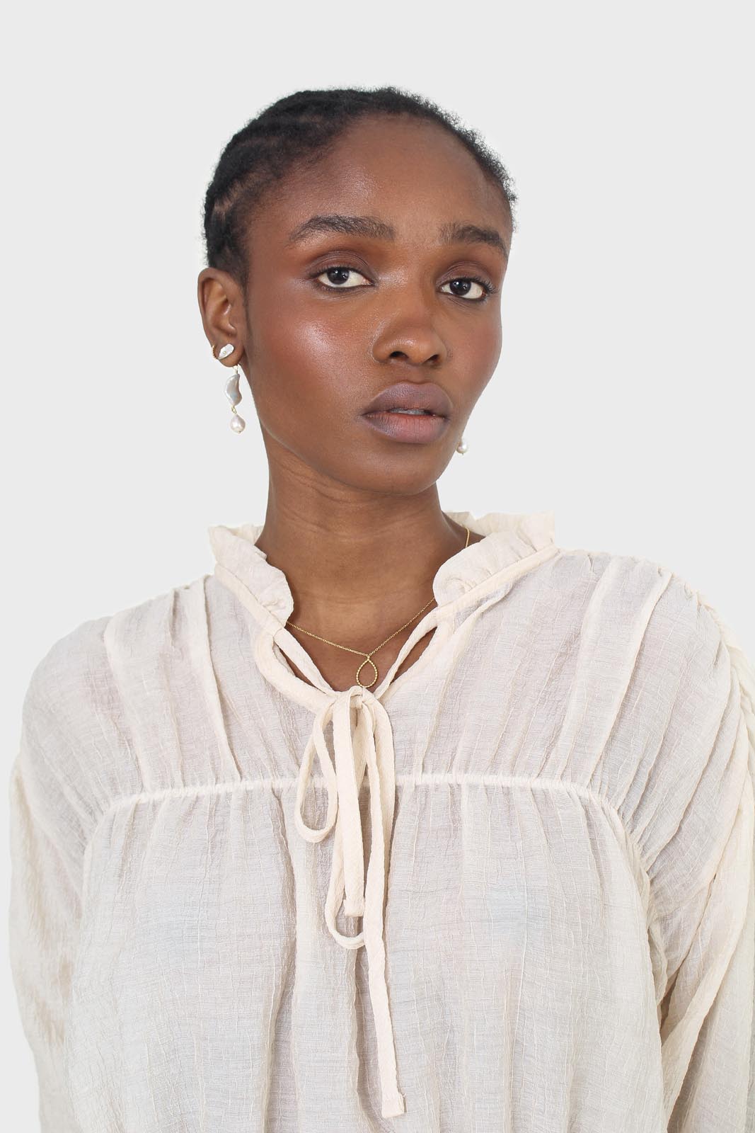 Beige sheer frill cuff tiered blouse