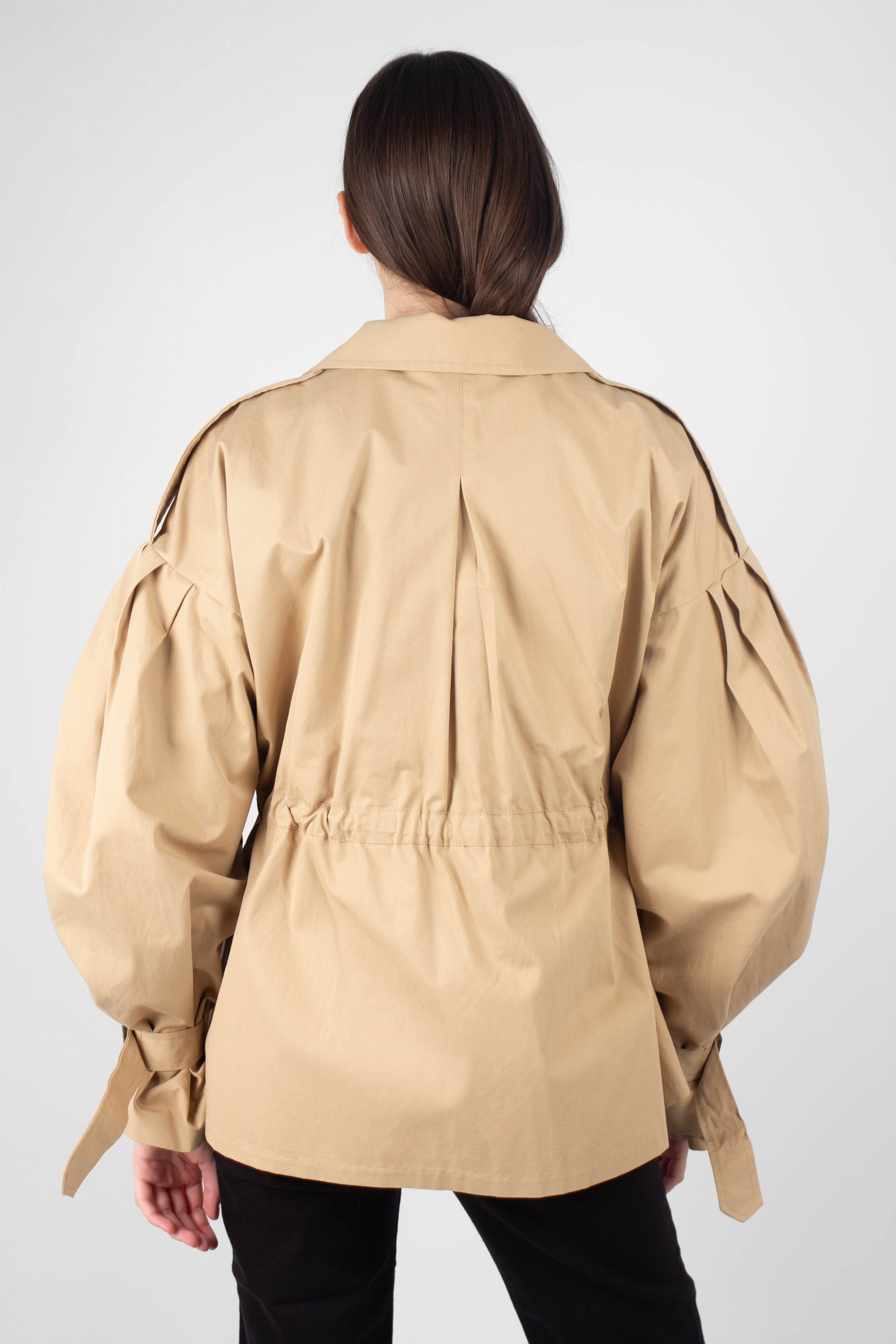 Beige double breasted half length trench coat