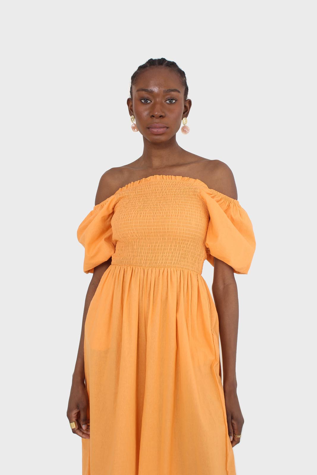 Orange short sleeved ruched bodice jumpsuit