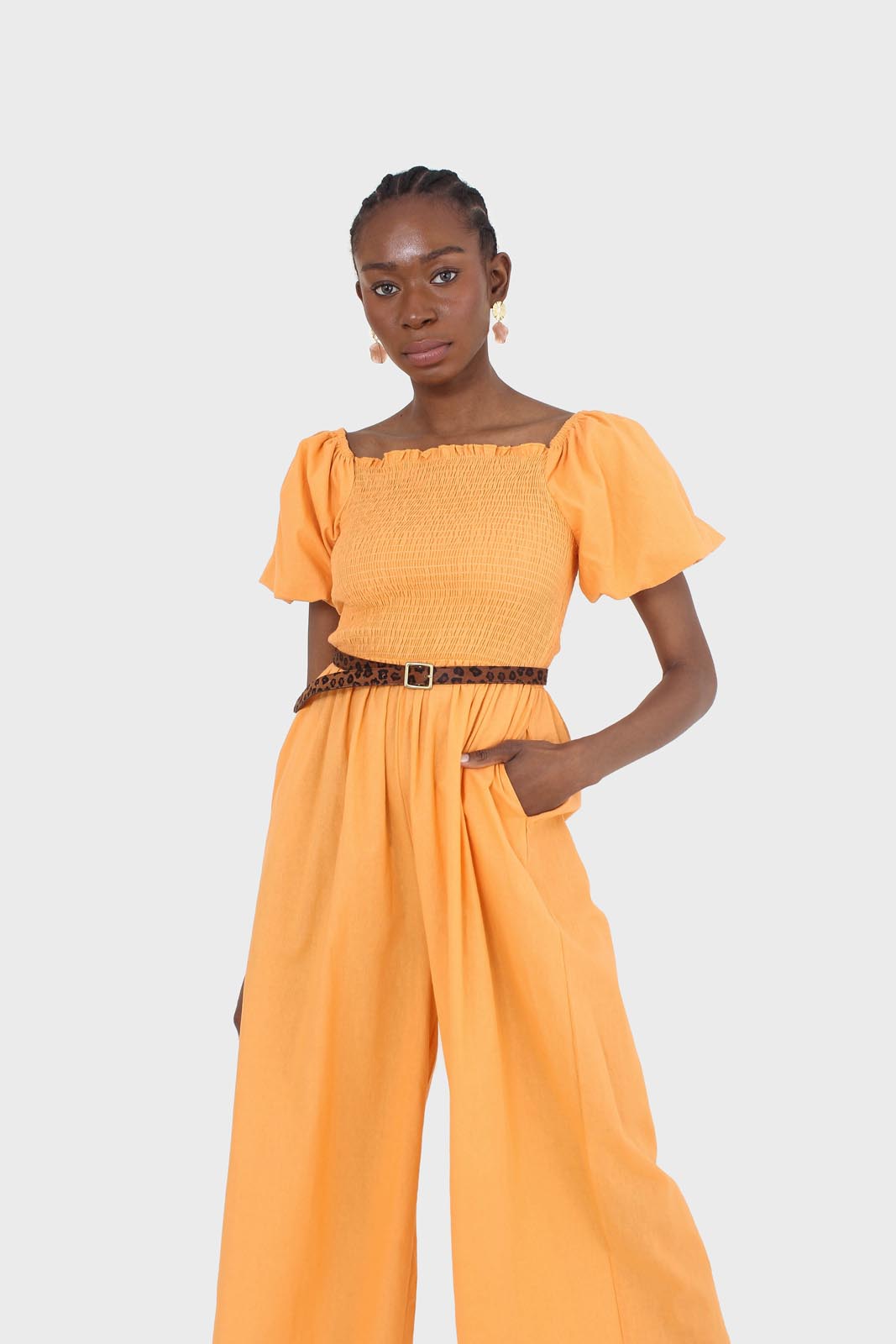Orange short sleeved ruched bodice jumpsuit