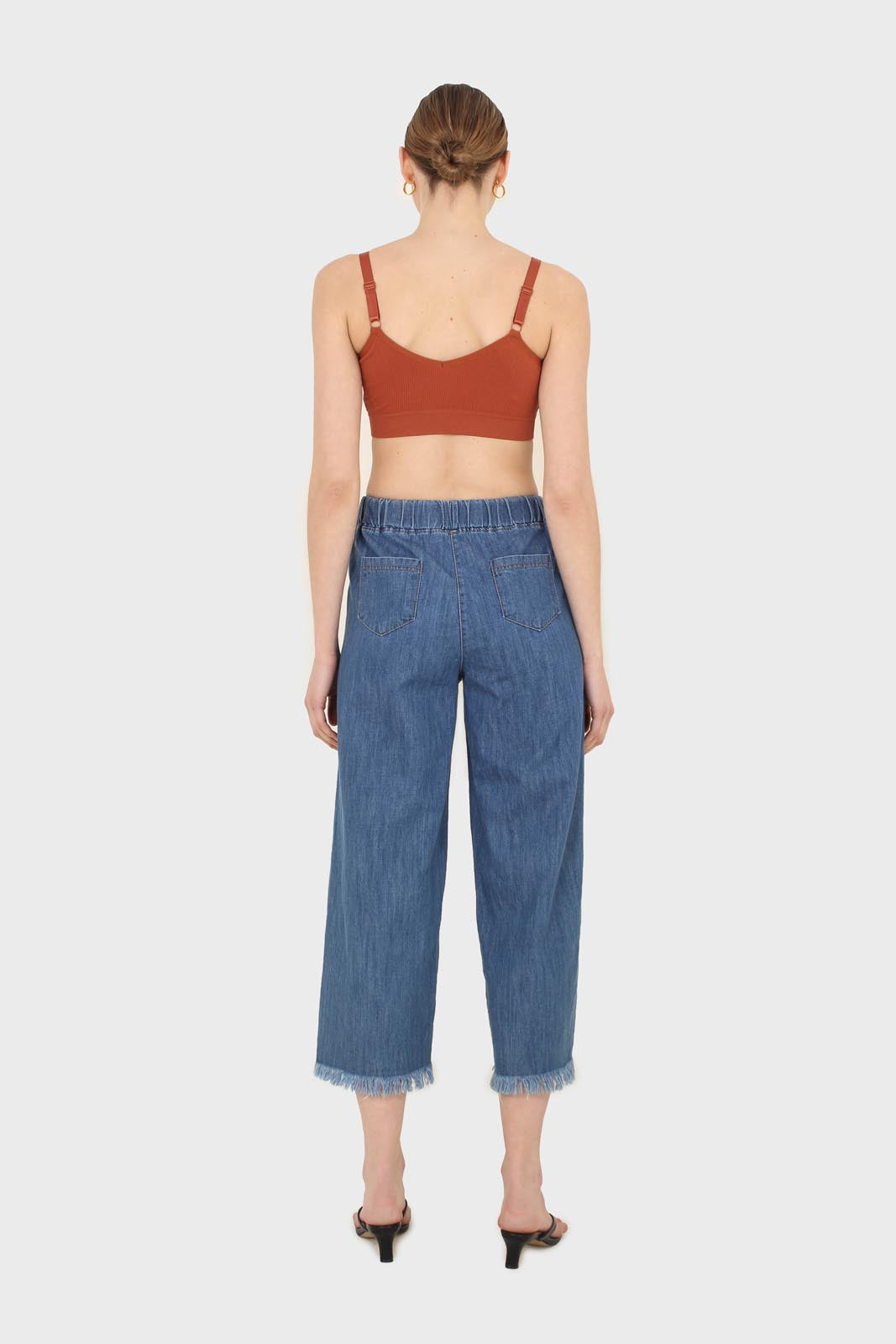 Blue pin tuck raw hem jeans