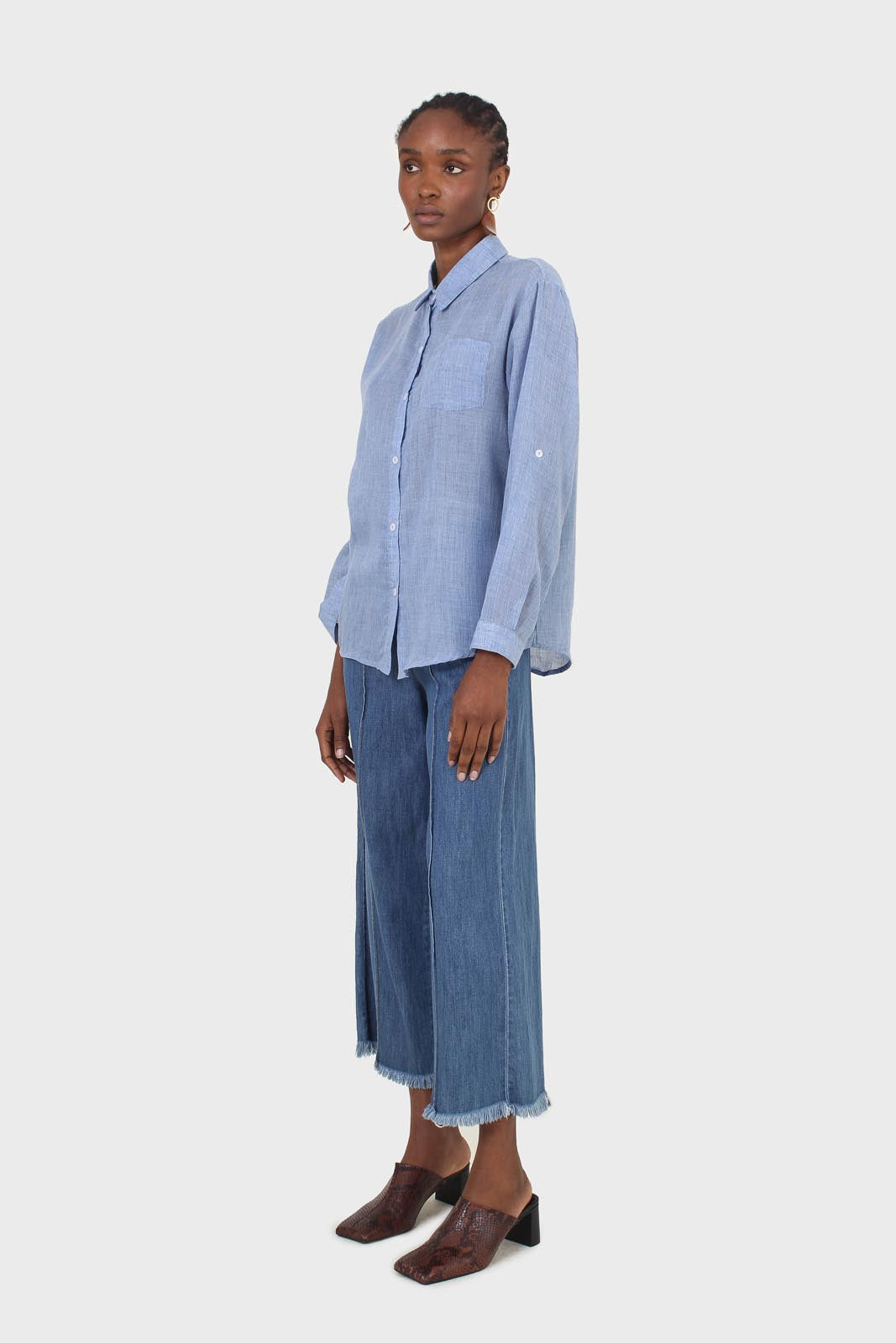 Blue pin tuck raw hem jeans
