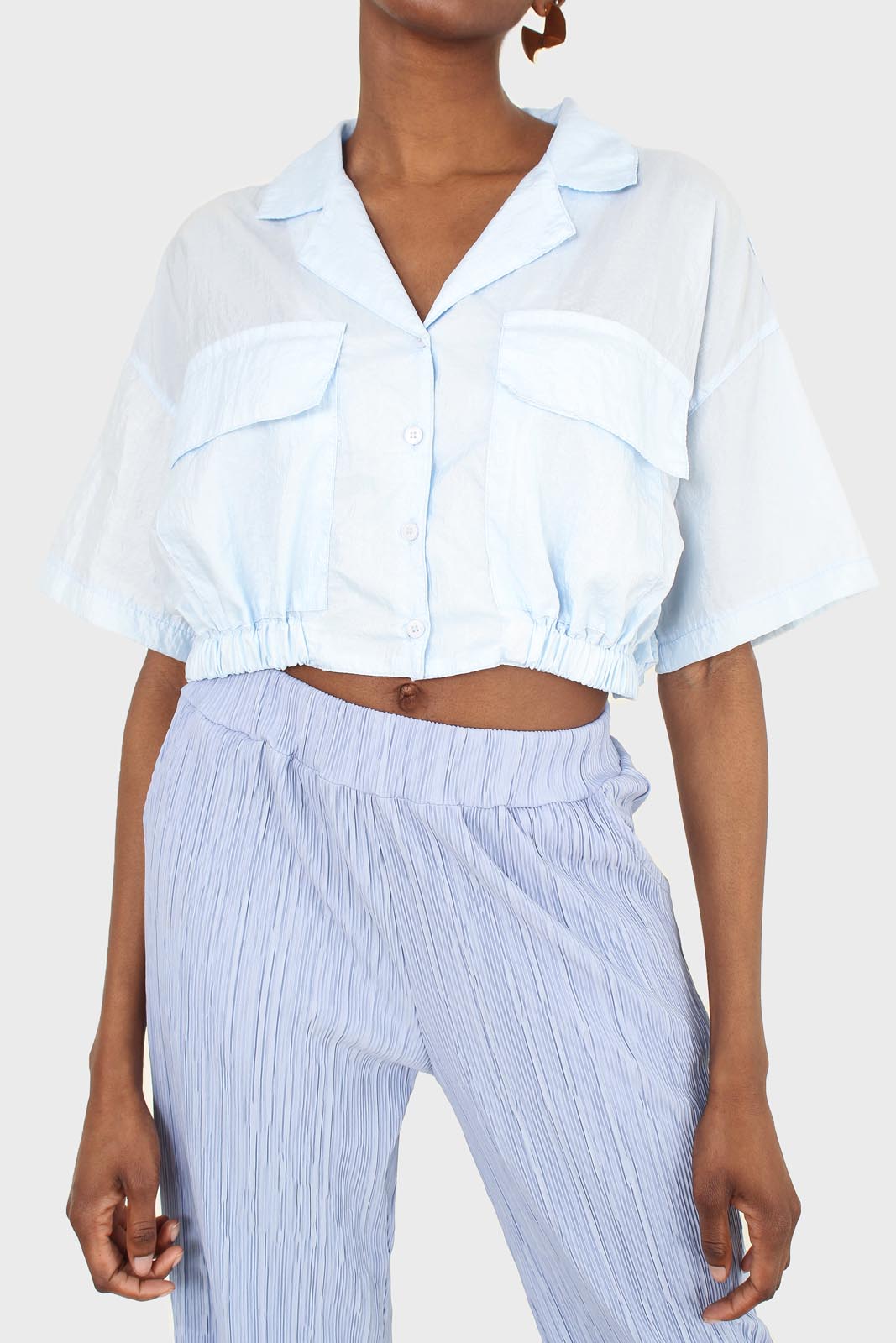 Light blue tie back short sleeved shirt