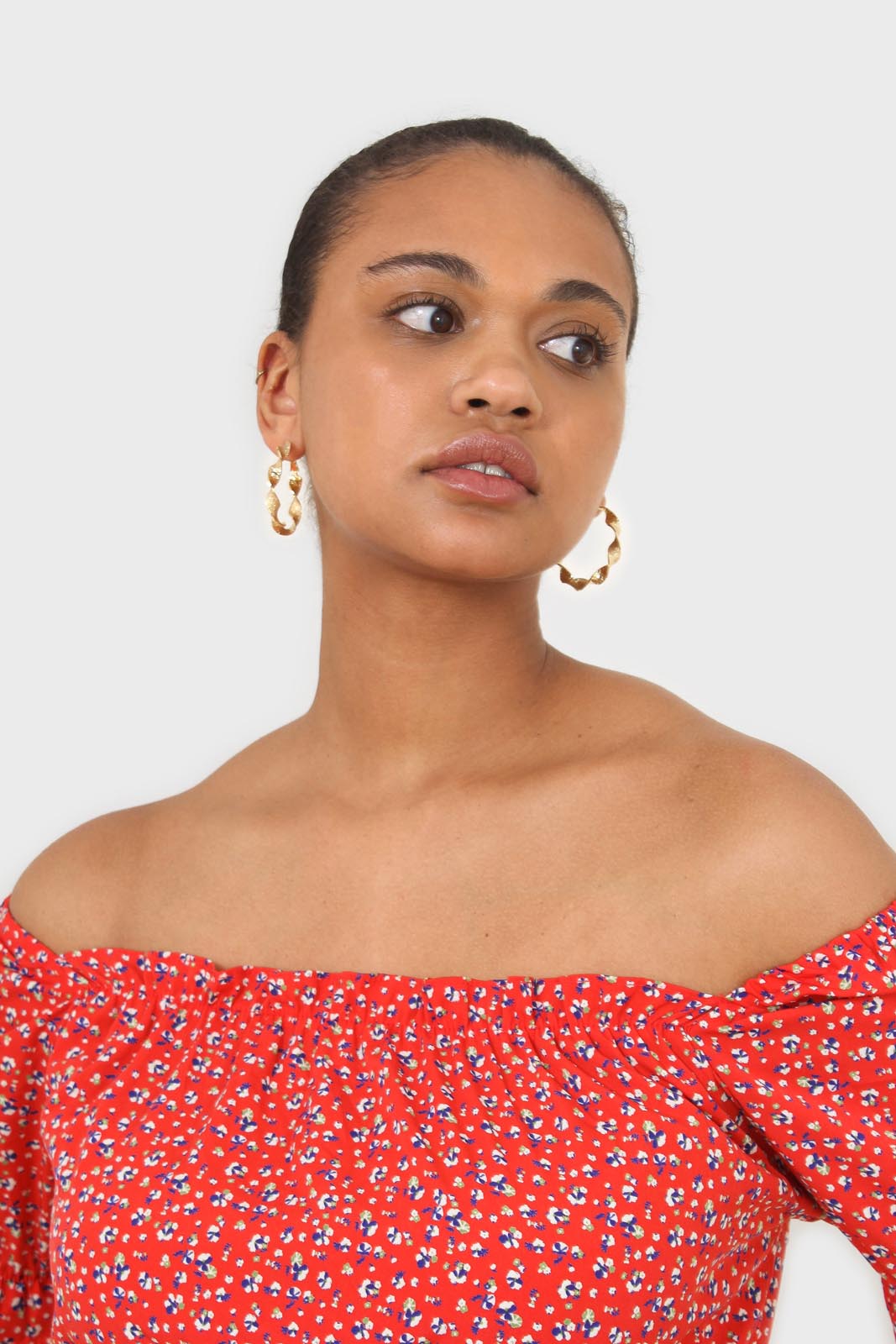 Red floral print off shoulder short sleeved top