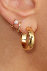 Gold dangling pearl single huggie earring - 4mm