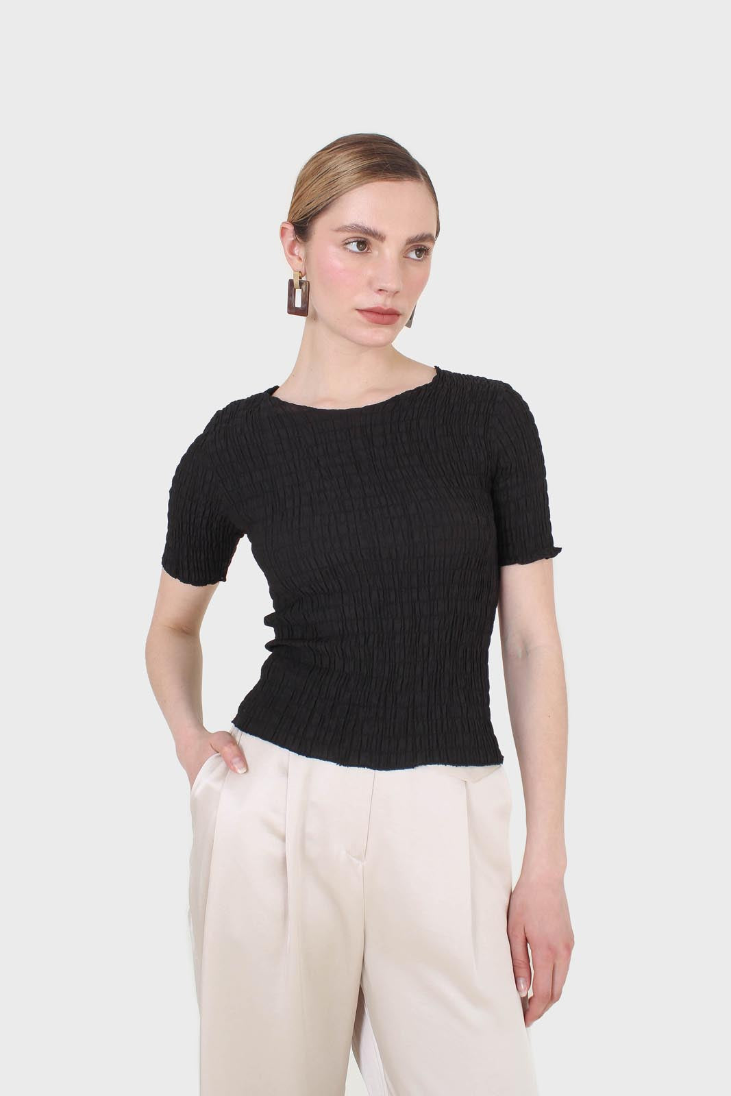 Black smocked fitted short sleeved top