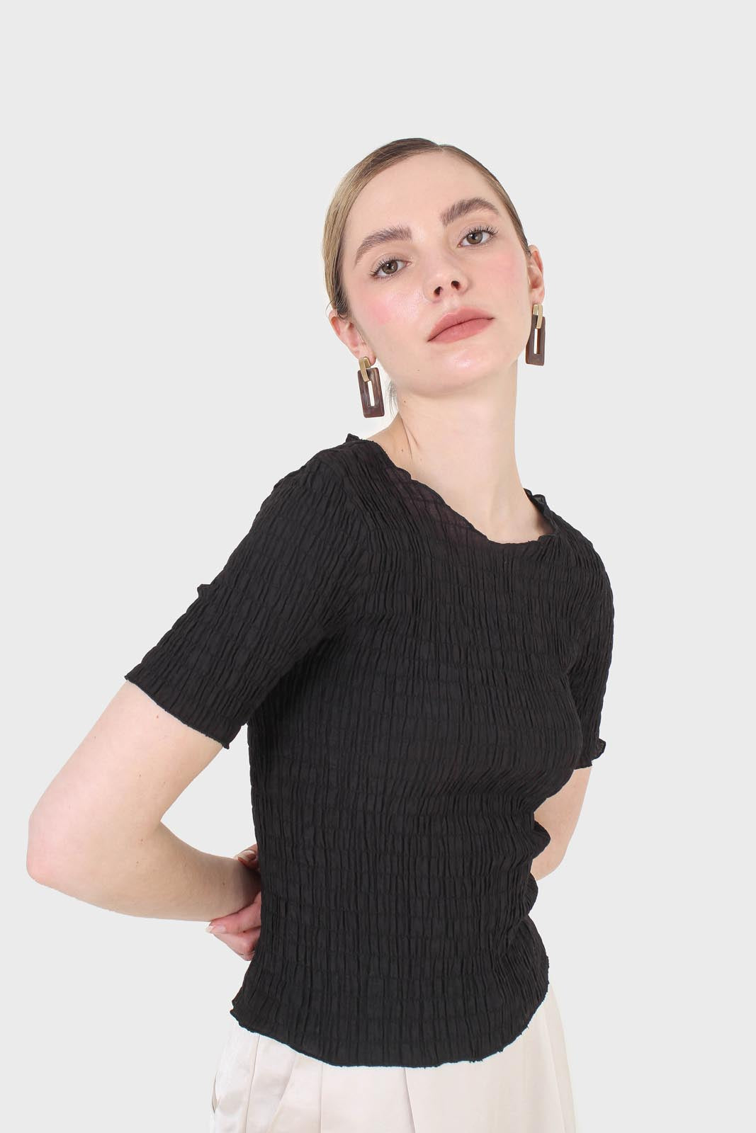 Black smocked fitted short sleeved top