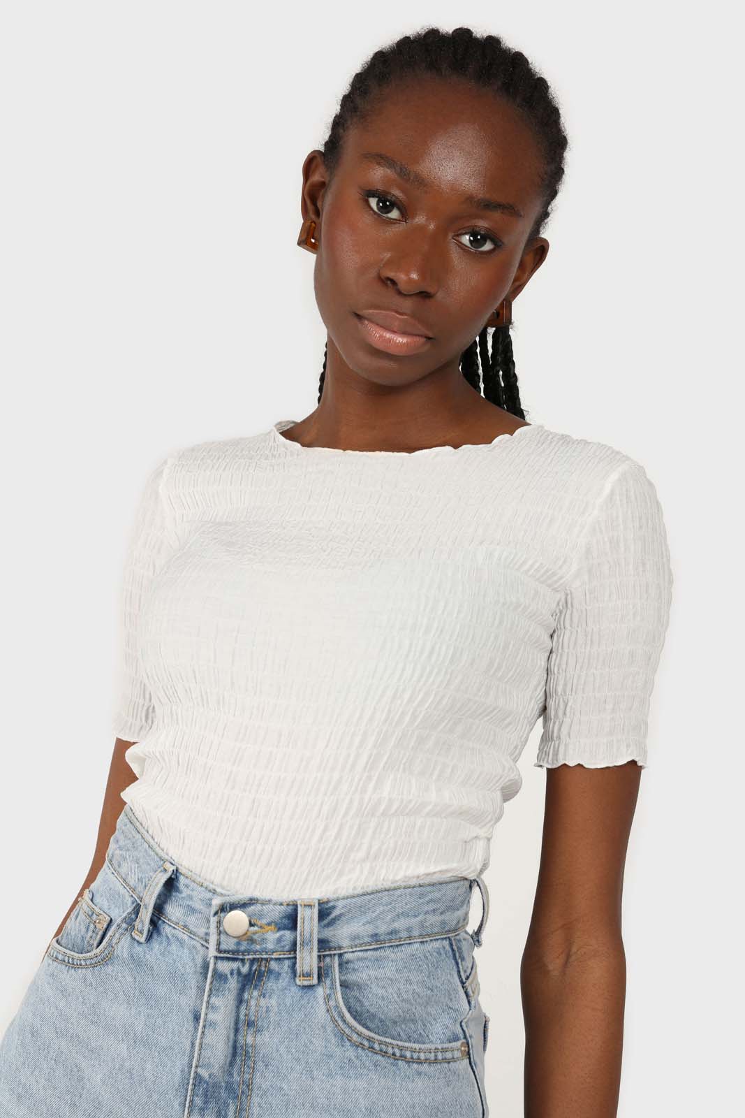 White smocked fitted short sleeved top