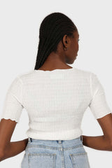 White smocked fitted short sleeved top