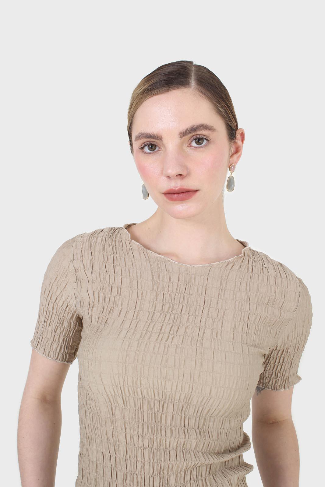 Beige smocked fitted short sleeved top