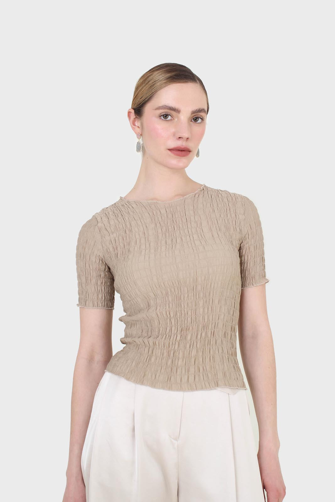 Beige smocked fitted short sleeved top