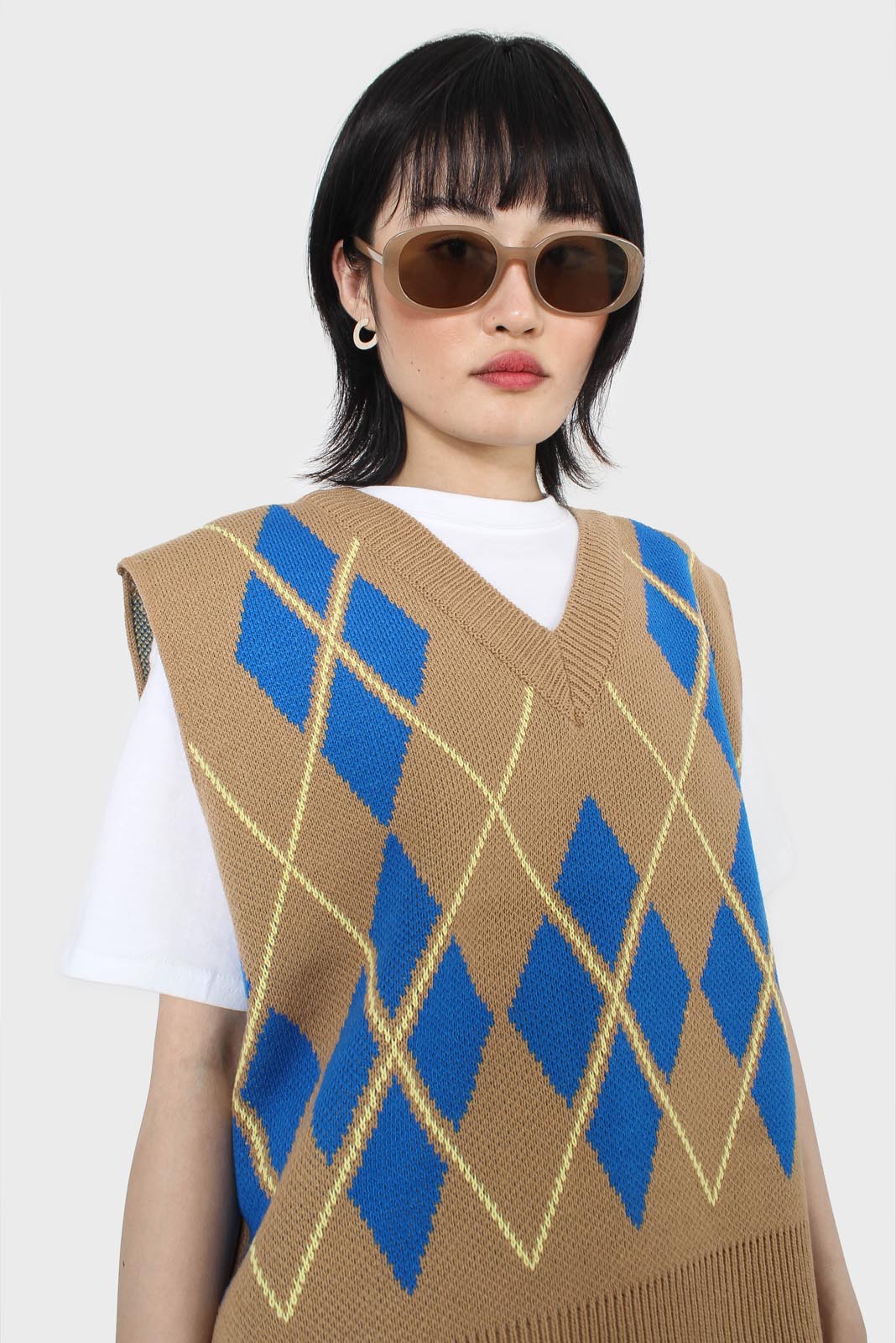 Camel and bright blue argyle sweater vest