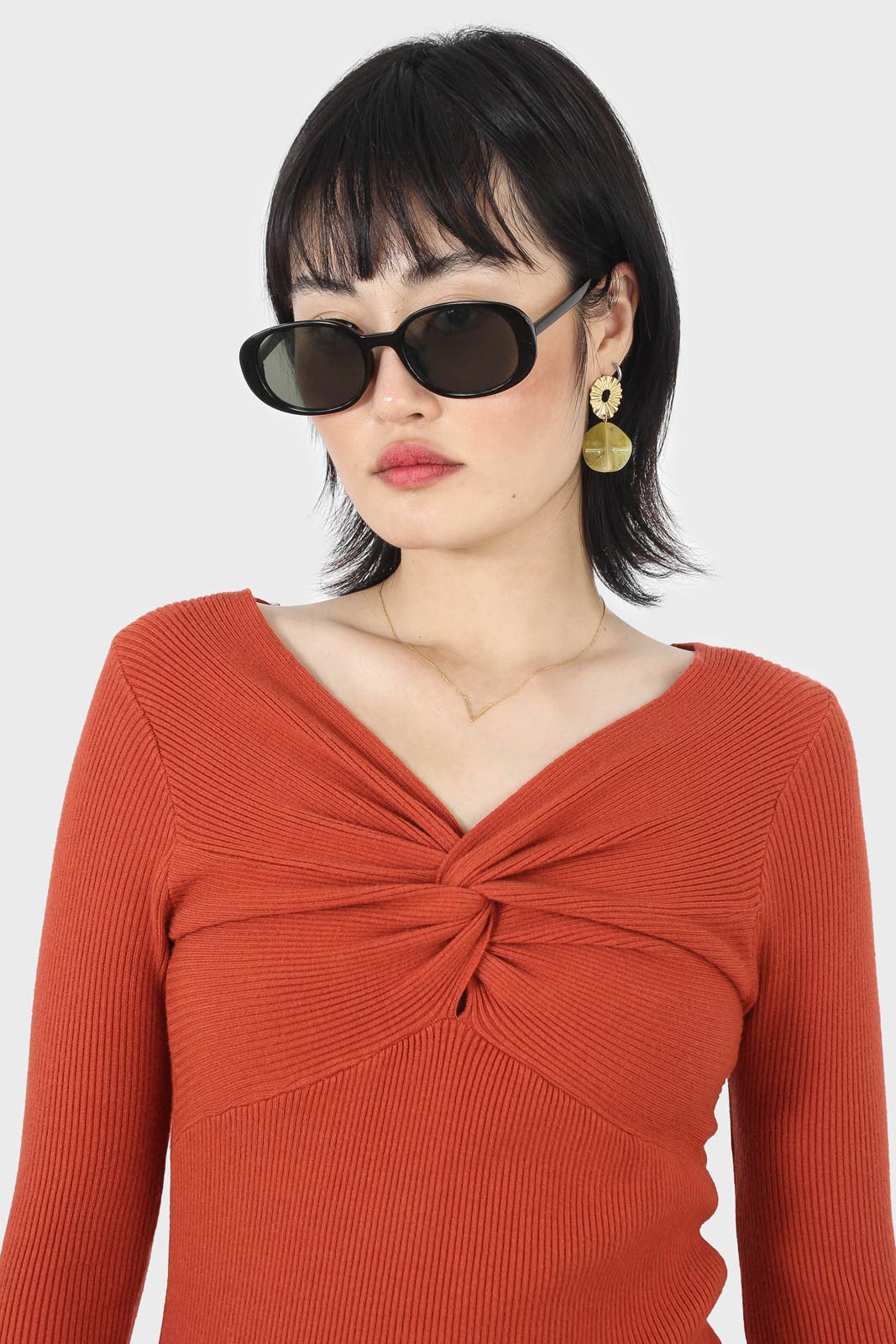 Orange cross front chest knit top