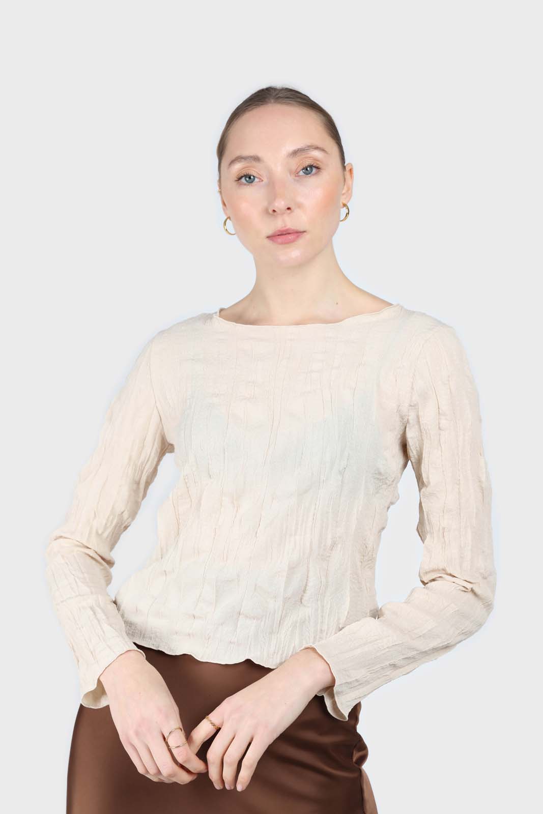 Beige wrinkled long sleeved top