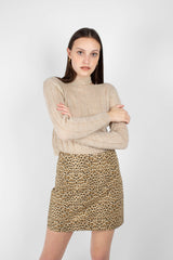 Beige neck slit cropped long sleeved knit top